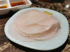 腌萝卜片-猪啊牛呀羊啊铜盘烤肉(正大广场店)