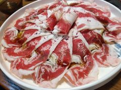 浇汁肥牛肉-正宗齐齐哈尔烤肉·齐牛哥鲜切炭火烤肉(杭州总店)