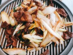 经典葱爆小羔羊肉-悦融·京鲁菜·露台花园(安定门店)