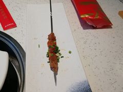 烤羊肉串-三人行骨头王火锅(长寿店)