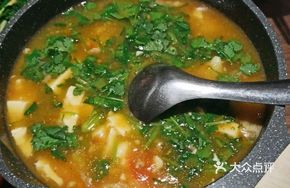 Fresh Fish Head and Tofu Soup with Coriander