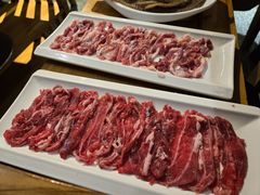 -明何记涮牛肚(品牌首店隋唐植物园南门古城路店)