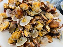 辣炒蛤蜊-1910老鲁味海鲜·戳子肉·青岛菜(金沙滩店)