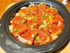 铁板包浆豆腐-北大荒人(即墨店)
