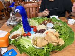 -沐毫傣泐云南菜孔雀宴•手抓饭傣味烧烤(曼听公园店)