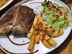 香煎T骨牛排-新贝乐意大利餐厅(镇江苏宁广场店)